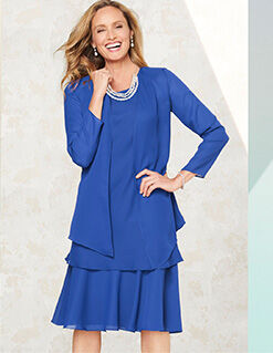 woman wearing royal blue Flirty brand dress