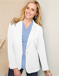 model wearing white linen-look blazer with light blue blouse under