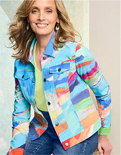 model wearing multi-colored, abstract pattern jacket with light green shirt underneath