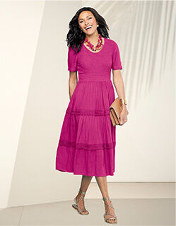 woman wearing mauve dress