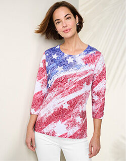 model wearing red,white, and blue 3/4 sleeve length shirt