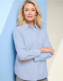 model wearing light blue button-up blouse