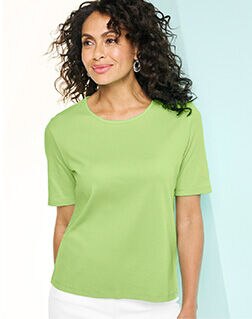 woman wearing lime green short-sleeve tee