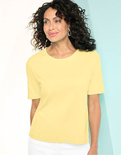 woman wearing yellow tee shirt