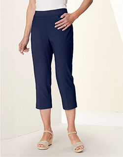 waist-down view of model wearing dark blue pants