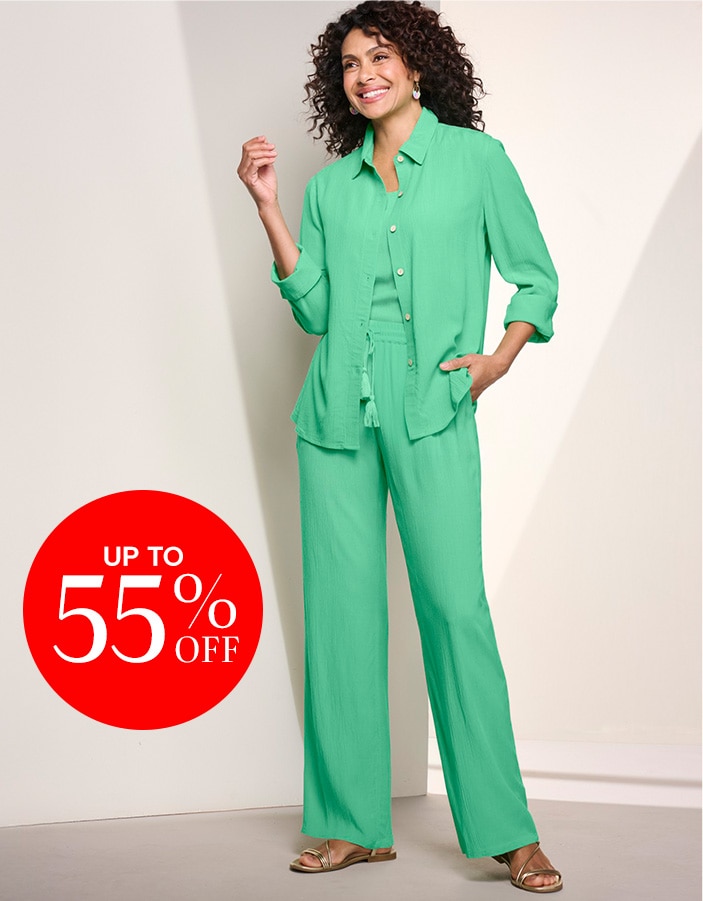 model wearing light green outfit: button-up shirt, matching shell underneath, and matching pants